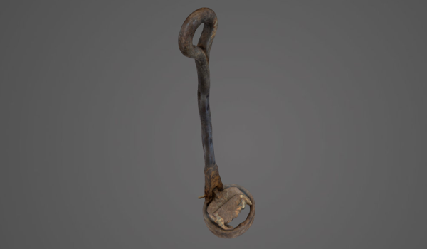 A tall rusty fishing tool.