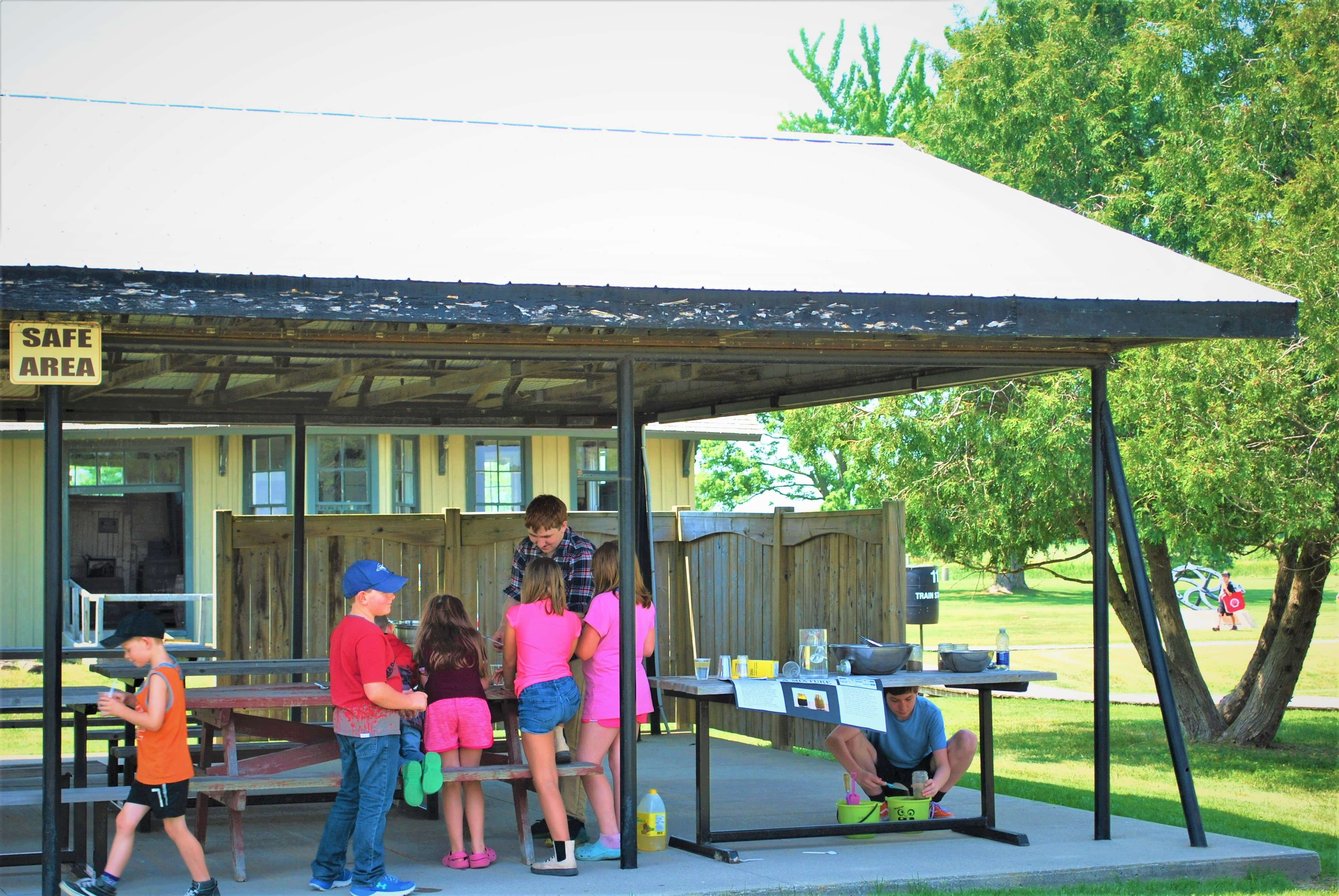 children under pavillion