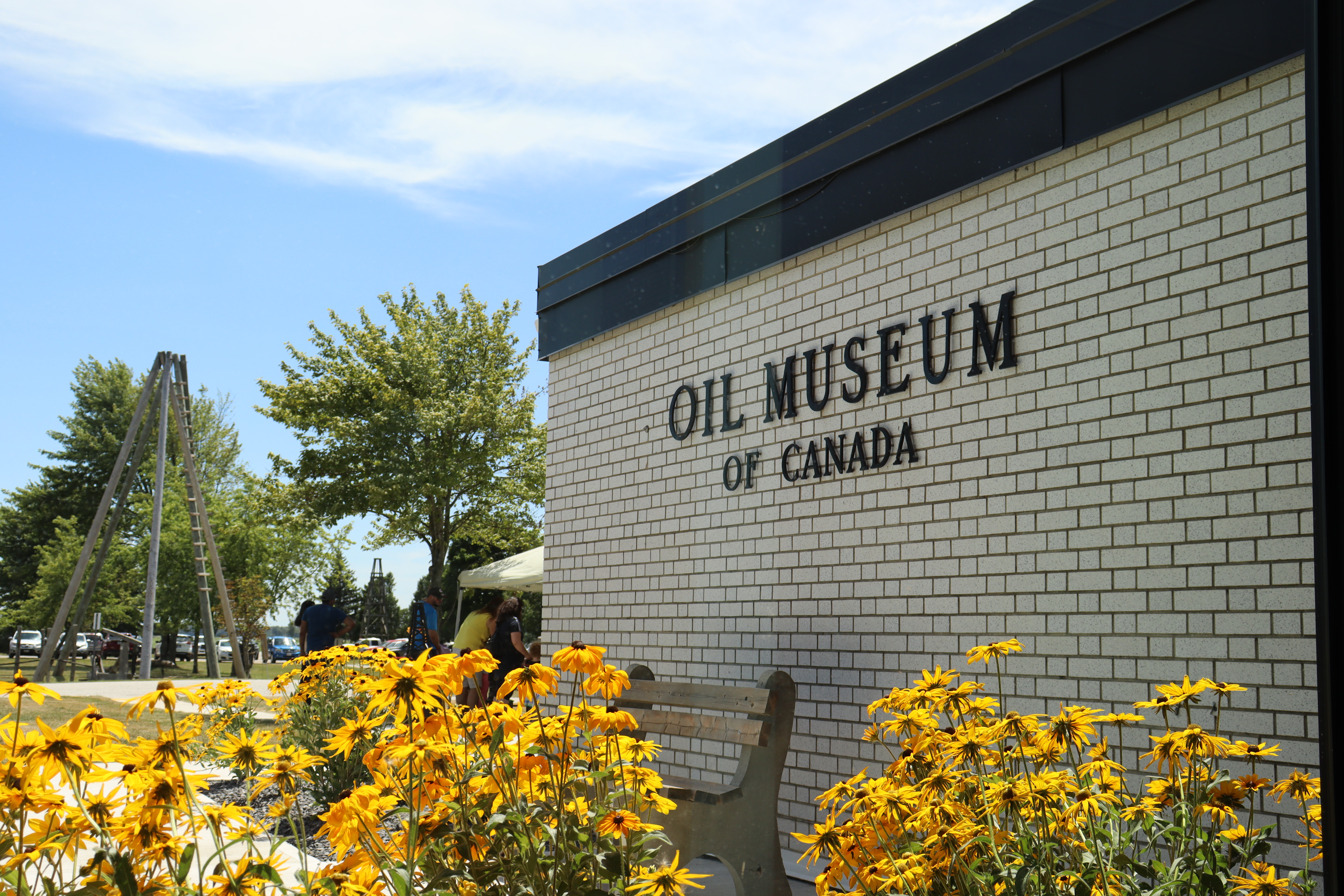 Oil Museum exterior with yellow flowers.